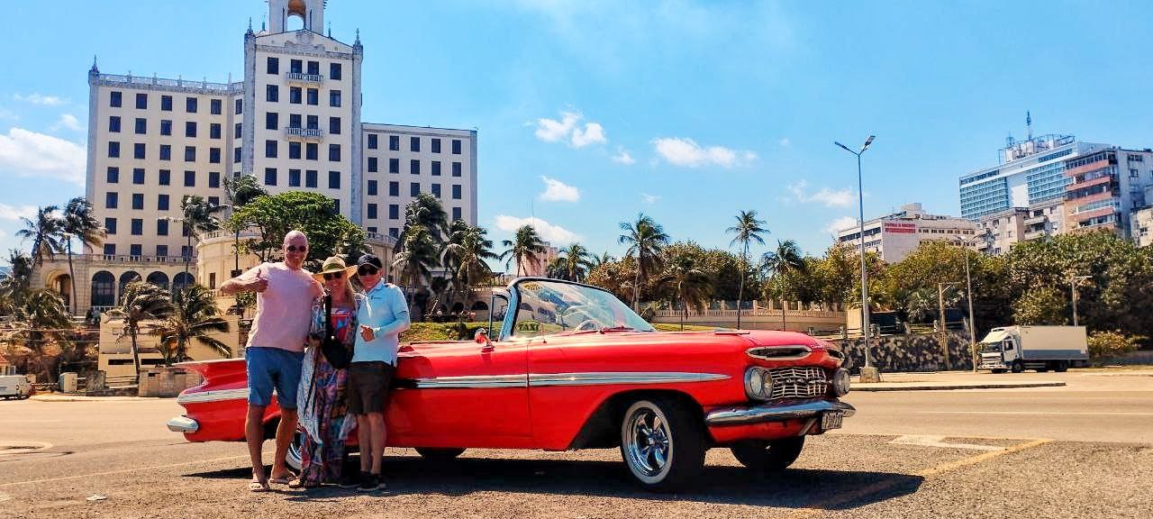 Classic red convertible car on a private Havana tour with VC Tours – up to 4 passengers